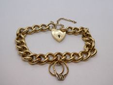 9ct gold heavy curb link bracelet with heart shape padlock clasp and safety chain, AF, marked 375, h
