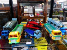 Small shelf of Dinky playworn trucks (7)