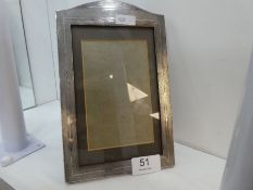 A silver photo frame of engine turned design, rectangular in shape. Hallmarked Birmingham 1926, Will