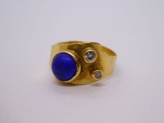 Unmarked yellow metal, possibly 18ct yellow gold, unusual design ring set with two diamonds and poss
