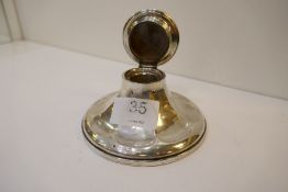 A silver Capstan inkwell with fluted decoration and hinged lid, Hallmarked Birmingham 1926 possibly