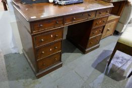 A Victorian mahogany twin pedestal desk having 7 drawers