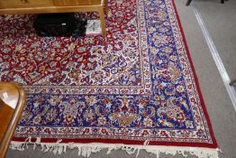 A modern Iranian carpet having all over floral design with central Spandrel, blue bordered, 294 x 38