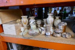 A quantity of various alabaster items including eggs, vases, lamp, etc