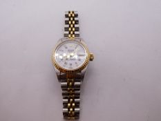 A Ladies 'ROLEX' bi-metal Date Just watch. Gold bezel with a cream dial, inset with diamonds, winds