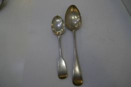 A silver Victorian dessert spoon hallmarked London 1842, John and Henry Lias. Also with a heavy silv