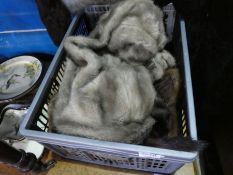 A tray of fur collars and similar