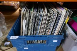A box of LPs including 1980s, 1990s  12" and 45s