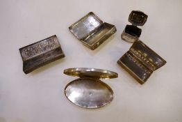 A selection of silver and white metal pill boxes including Swedish, possibly Chinese and, British si