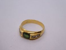 18ct yellow gold ladies ring, central oval, emerald, flanked with 3 graduating white sapphires, size