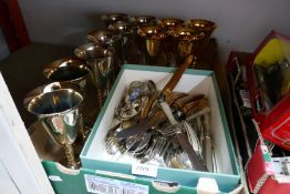 A selection of silver plated cutlery and goblets