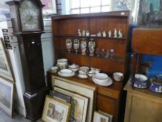 A 1970s teak sideboard with rack back