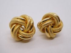 14k yellow gold knot design earrings marked 14k, approx 6.9g