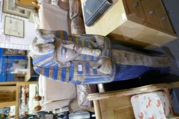 A modern carved wooden figure Tutankhamun