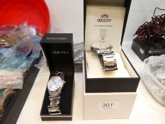 Two modern gent's wristwatches by Orient & Sekonda and a vintage clutch bag
