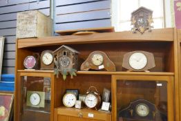 A large quantity of clocks, movements and similar and various clock books