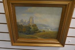 An old oil of castle ruins on hilltop singed W Pinkney 140cm x 31cm
