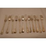 Twelve silver Victorian forks with ornate, engraved design handles. Four hallmarked London 1863, Cha