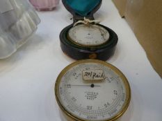 An antique compensated pocket barometer by J Browning and one other by J.Hicks