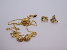 18ct yellow gold necklace and earring set the necklace having a panel depicting two hands holding