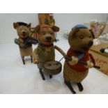 Schuco; three vintage clockwork pig musicians