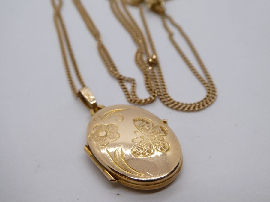 9ct yellow gold neckchain hung with an oval engraved locket, marked 375, 4g approx - Image 2 of 3