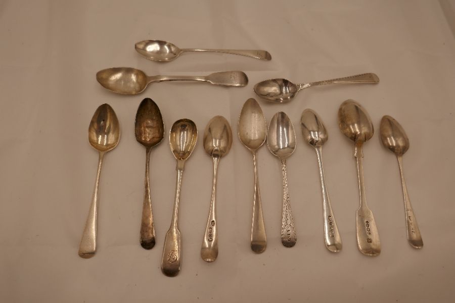 A quantity of Georgian silver teaspoons to include one with beaded border, hallmarked 1792 Thomas Wa