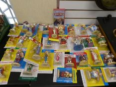 A quantity of Asterix resin figures in original blister packaging