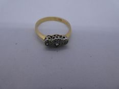 18ct yellow gold illusion set diamond trilogy ring, marked 750, size N/O, 2.5g approx. Gold content