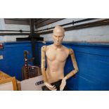 Vintage male mannequin, with articulated wooden arms