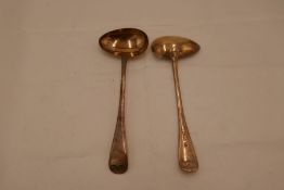 A pair of Victorian silver sauce ladles. Hallmarked Sheffield 1895, Arthur Priestly and Co. 2.21ozt