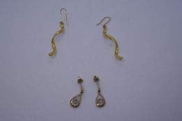 Two pairs of 9ct gold earrings, one of twist design, both marked 375, 3g approx. Gold content value