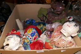 Box containing mostly vintage Asian puppets