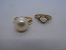 9ct yellow gold pearl set dress ring and an unmarked yellow metal example mounted simulated pearl