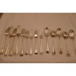 Walker and Hall, Sheffield 1911 silver cutlery cmprising of five dessert spoons, five larger forks a