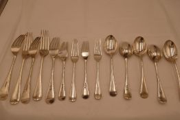 Walker and Hall, Sheffield 1911 silver cutlery cmprising of five dessert spoons, five larger forks a