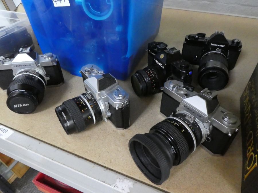 A quantity of vintage SLR cameras including numerous Nikkormat models, a quantity of Nikon lenses an - Image 2 of 4