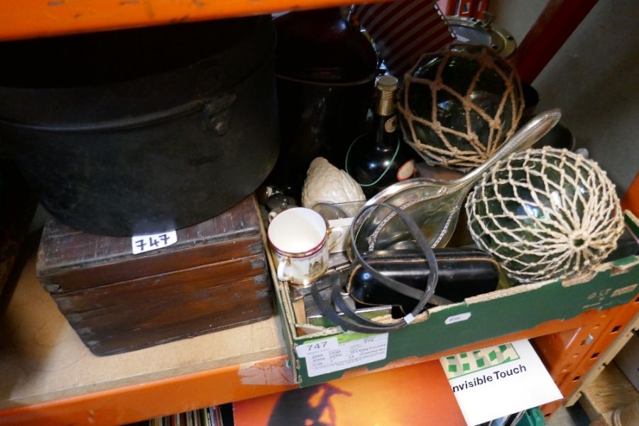 A tray of various collectables, including Canon camera