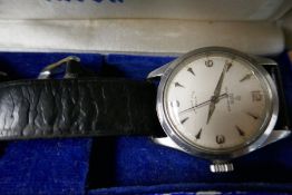 A gents Tudor Rolex watch possibly dating from the 1960s in a stainless steel case. Complete with it