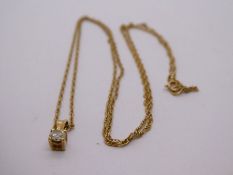 9ct yellow gold neckchain hung with a pendant set with a diamond, marked 375, approx 0.10 carat, 1.1