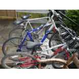 A Raleigh Mountain bike and two others
