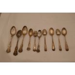 A quantity of silver teaspoons, ornate design stamped sterling. also with a set of four London 1900