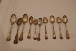 A quantity of silver teaspoons, ornate design stamped sterling. also with a set of four London 1900