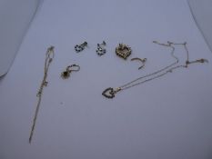 A collection of 9ct, yellow metal and pendants, chain, etc