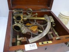 A Victorian brass sextant by J.Coombes, Devon port in fitted mahogany case. Also engraved R.A.Wilson