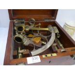 A Victorian brass sextant by J.Coombes, Devon port in fitted mahogany case. Also engraved R.A.Wilson