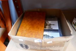 A box of mostly modern/vintage postcards depicting various scenes