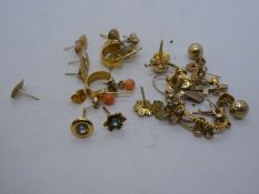 Quantity of 9ct and yellow metal stud earrings including coral stud example, small pair of hoops etc