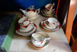 A selection of china in a Clarice Cliff type design