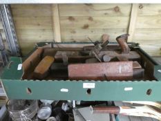 A tray of old wooden planes and similar